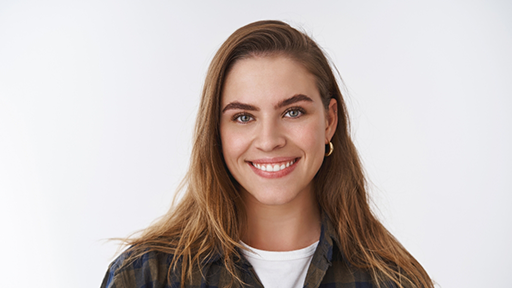 Smiling woman with long straight brown hair