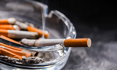 Ashtray full of cigarettes