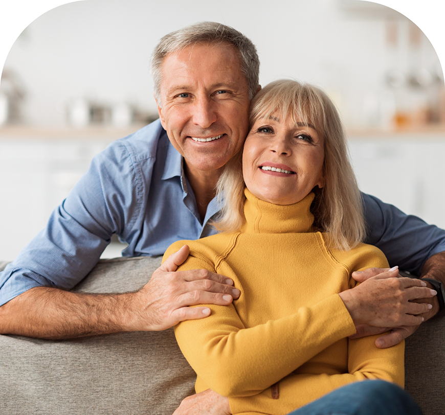 Older couple smiling with dental inlays and onlays in Burbank
