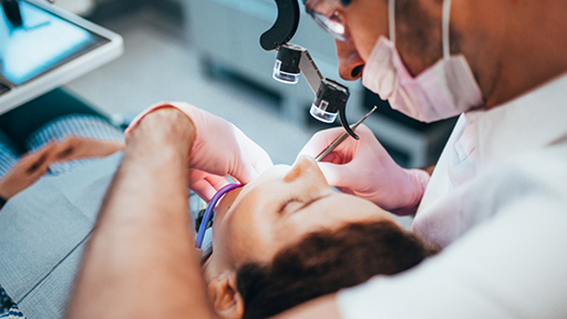 Dental patient receiving root canal treatment in Burbank