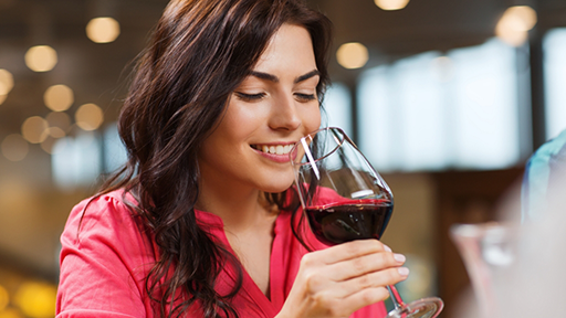 Woman drinking red wine