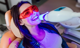 woman getting teeth whitening