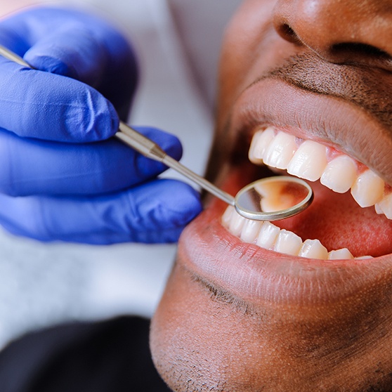 An African American man getting dental care