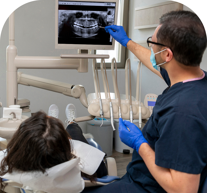Burbank emergency dentist showing a patient an x-ray of their teeth