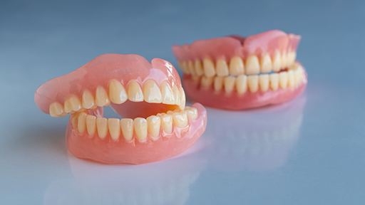 Two sets of full dentures